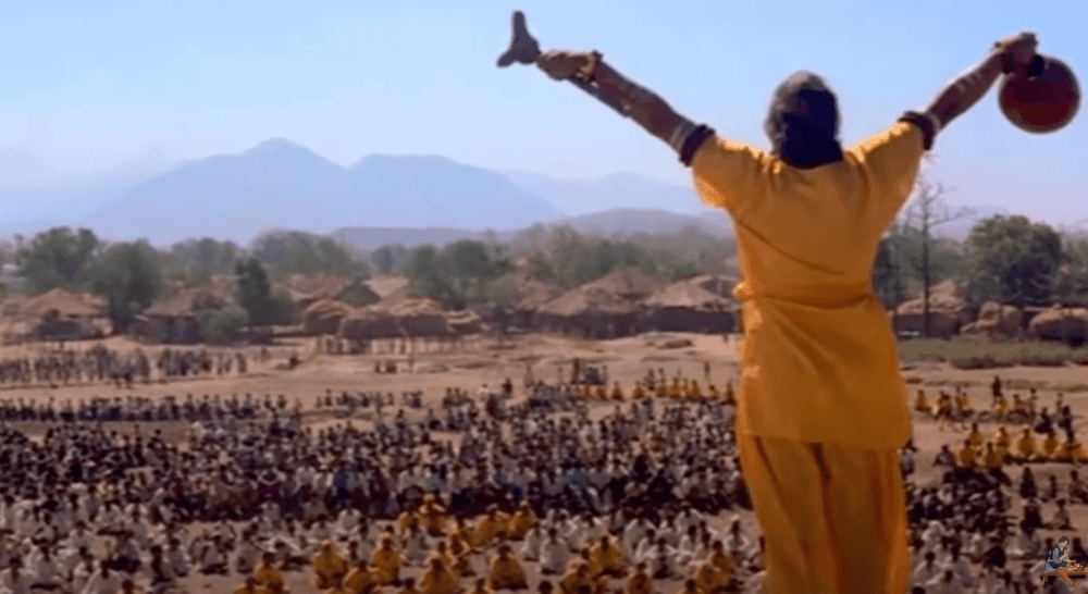 Swami raises danda stick